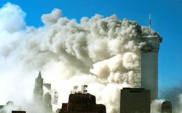 394261 158: Smoke pours out of the World Trade Center after the twin towers were struck by two planes during a suspected terrorist attack September 11, 2001 in New York City. (Photo by David Surowiecki/Getty Images)