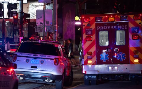 PROVIDENCE, RHODE ISLAND  DECEMBER 13: Emergency responders work at the scene near Brown University in Providence, Rhode Island, on December 13, 2025, following a mass shooting that left at least two people dead and eight others injured. Authorities said police launched a search for the suspect, who remained at large, while campus officials urged students and staff to shelter in place as the investigation continued. (Photo by Lokman Vural Elibol/Anadolu via Getty Images)