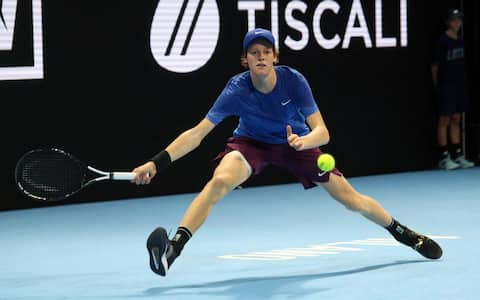 Jannik Sinner of Italy hits a return to  Alex De Minaur of Australia during their match valid for the final  of the Next Gen Atp Finals at  Allianz Cloud forum in Milan, Italy, 9 November  2019. The  Next Gen Atp Finals  runs from 05 November  through 09 November. ANSA / MATTEO BAZZI