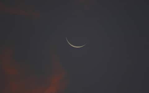 KEGMTF crescent or waning moon in its third or last quarter close to dawn in Italy with sunrise in mid October northern hemisphere waning moon