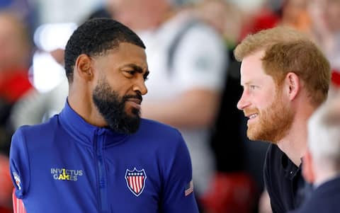 THE HAGUE, NETHERLANDS - APRIL 17: (EMBARGOED FOR PUBLICATION IN UK NEWSPAPERS UNTIL 24 HOURS AFTER CREATE DATE AND TIME) Prince Harry, Duke of Sussex talks with Team USA archer Gabriel 'Gabe' George as he attends the archery competition on day 2 of the Invictus Games 2020 at Zuiderpark on April 17, 2022 in The Hague, Netherlands. (Photo by Max Mumby/Indigo/Getty Images)