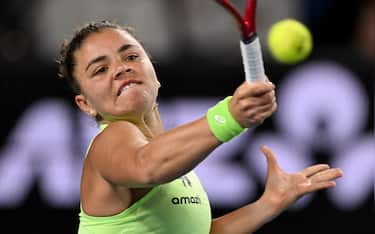 epa12666978 Jasmine Paolini of Italy in action during the Women s 2nd round match against Magdalena Frech of Poland on day four of the Australian Open tennis tournament in Melbourne, Australia, 21 January 2026.  EPA/LUKAS COCH  AUSTRALIA AND NEW ZEALAND OUT