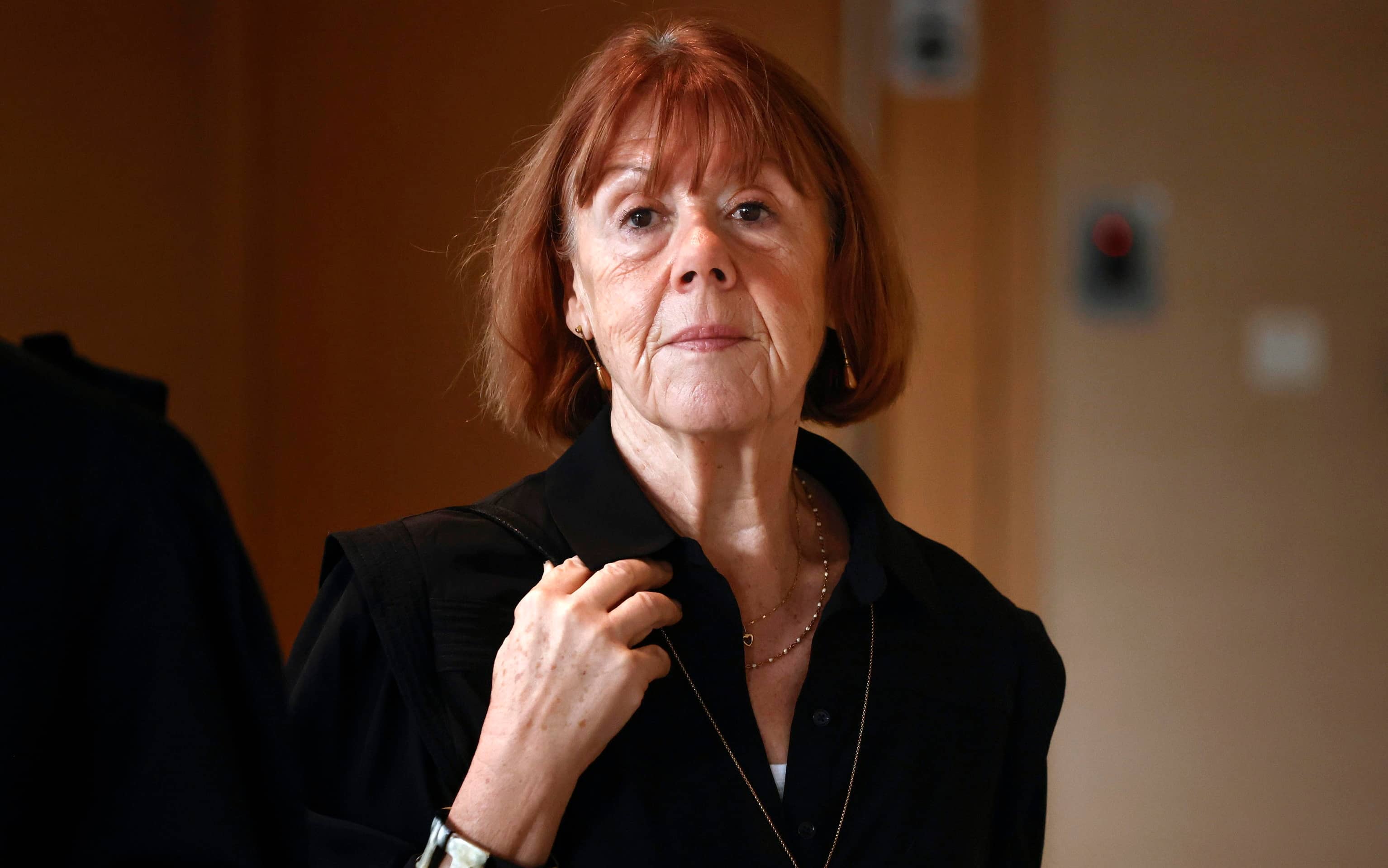 epa11741210 Gisele Pelicot leaves the criminal court in Avignon for a morning break, France, 26 November 2024, where her ex-husband stands trial. Dominique Pelicot is accused of drugging and raping his then-wife, Gisele Pelicot. He is also accused of inviting dozens of men to rape her while she was unconscious at their home in Mazan, France, between 2011 and 2020. Fifty other men are facing trial for their alleged involvement. Dominique Pelicot could face a maximum sentence of 20 years in prison if convicted.  EPA/YOAN VALAT