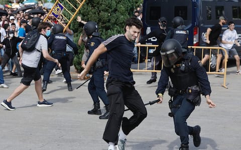 epa13278422 Protesters clash with police during a demonstration against the housing crisis in Valencia, Spain, 03 October 2026. Several demonstrations across the main cities of Spain are calling on the authorities to solve the housing problems. The eviction of an 87-year-old woman from her rental home after 70 years on 23 September 2026 prompted people across the country to take to the streets against the ongoing housing crisis. The government failed on 02 October in its attempt to pass its proposed emergency housing decrees in the Lower Chamber of the Spanish Parliament.  EPA/Kai Forsterling