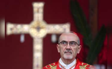 epa12858883 Cardinal Pierbattista Pizzaballa, the Latin Patriarch of Jerusalem, holds a prayer service to mark Palm Sunday, in Jerusalem, 29 March 2026, following the cancellation of the traditional Palm Sunday procession from the Mount of Olives, amid restrictions on gathering in large groups and the US-Israeli conflict with Iran.  EPA/Ammar Awad / POOL