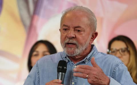 epa10273963 Brazilian presidential candidate Luiz Inacio Lula da Silva speaks during a press conference along with former Uruguayan president Jose 'Pepe' Mujica, in Sao Paulo, Brazil, 29 October 2022. Brazilians will go to the polls 30 October to decide between Lula or his rival, current President Jair Bolsonaro, as head of State for the 2022-2026 period.  EPA/Sebastiao Moreira