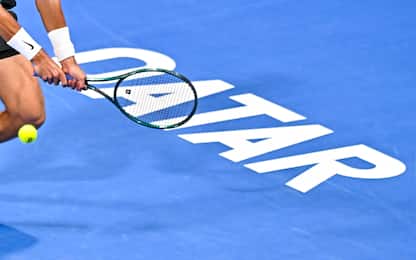 epa11177953 Karen Khachanov of Russia in action against Jakub Mensik of the Czech Republic during their final match at the Qatar Open tennis tournament in Doha, Qatar, 24 February 2024.  EPA/NOUSHAD THEKKAYIL