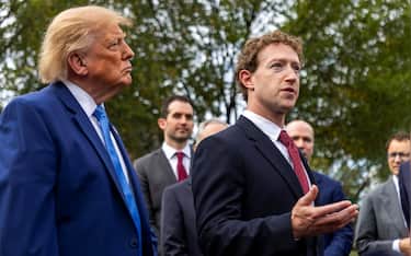 epa13271663 US President Donald J. Trump (L) listens as Meta CEO Mark Zuckerberg (R) delivers remarks to the news media outside the West Wing of the White House in Washington, DC, USA, 29 September 2026. President Trump and leading technology executives spoke to reporters outside the West Wing following a meeting which was focused on artificial intelligence, innovation and oversight.  EPA/SHAWN THEW