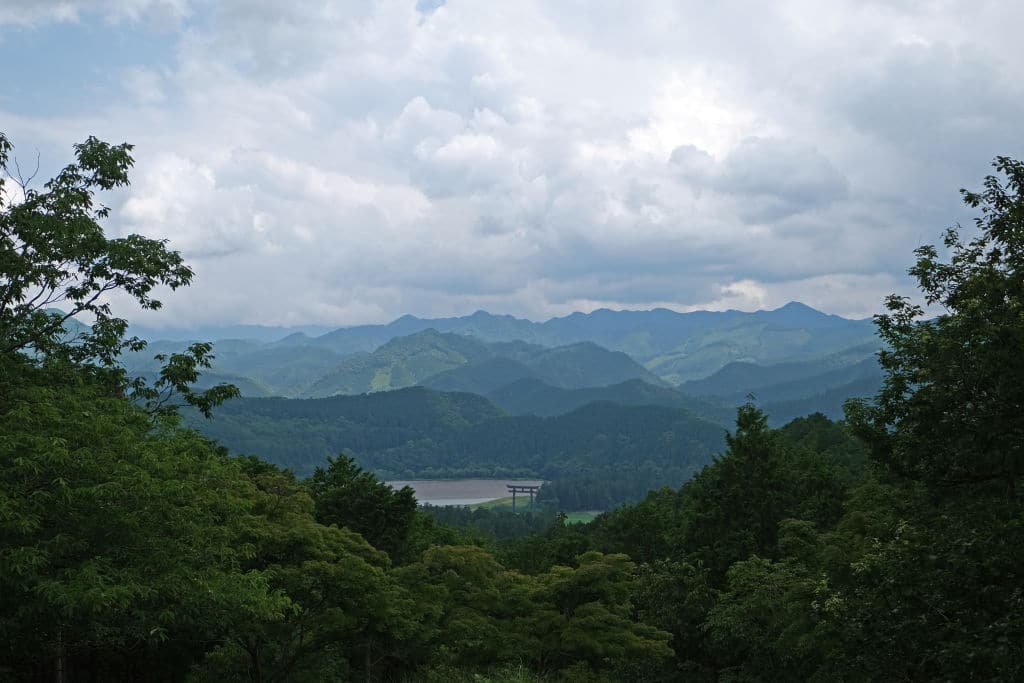 TANABE, JAPAN - JUNE 12: The world's largest Torii gate (33.9 meters tall) standing at the entrance of Oyunohara, which is the original site of Kumano Hongu Taisha, is seen from Kumano Kodo's Nakahechi pilgrimage route on June 12, 2019 in Tanabe, Wakayama Prefecture, Japan. The Kumano Kodo is a series of ancient pilgrimage routes that connect "Kumano Sanzan" or three grand shrines - Kumano Hongu Taisha, Kumano Nachi Taisha and Kumano Hayatama Taisha. Kumano Kodo, Kumano Sanzan are registered as World Heritage sites along with Koyasan, Yoshino and Omine as the "Sacred Sites and Pilgrimage Routes in the Kii Mountain Range.  (Photo by Yuriko Nakao/Getty Images)