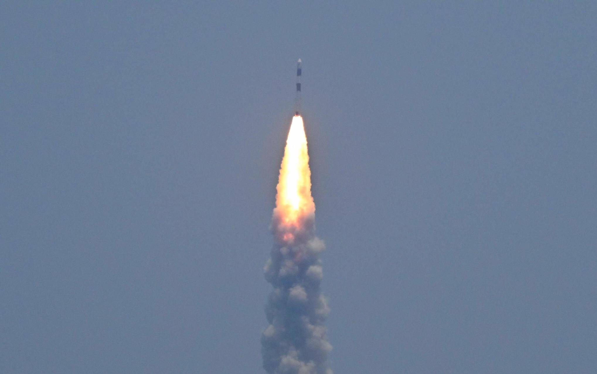 PSLV XL rocket carrying the Aditya-L1 spacecraft, the first space-based Indian observatory to study the Sun, is launched from the Satish Dhawan Space Centre in Sriharikota on September 02, 2023. The latest mission in India's ambitious space programme blasted off September 2, on a voyage to the centre of the solar system, a week after the country's successful unmanned Moon landing. Aditya-L1 is carrying scientific instruments to observe the Sun's outermost layers, launching shortly before midday to begin its four-month journey. (Photo by R. Satish BABU / AFP)