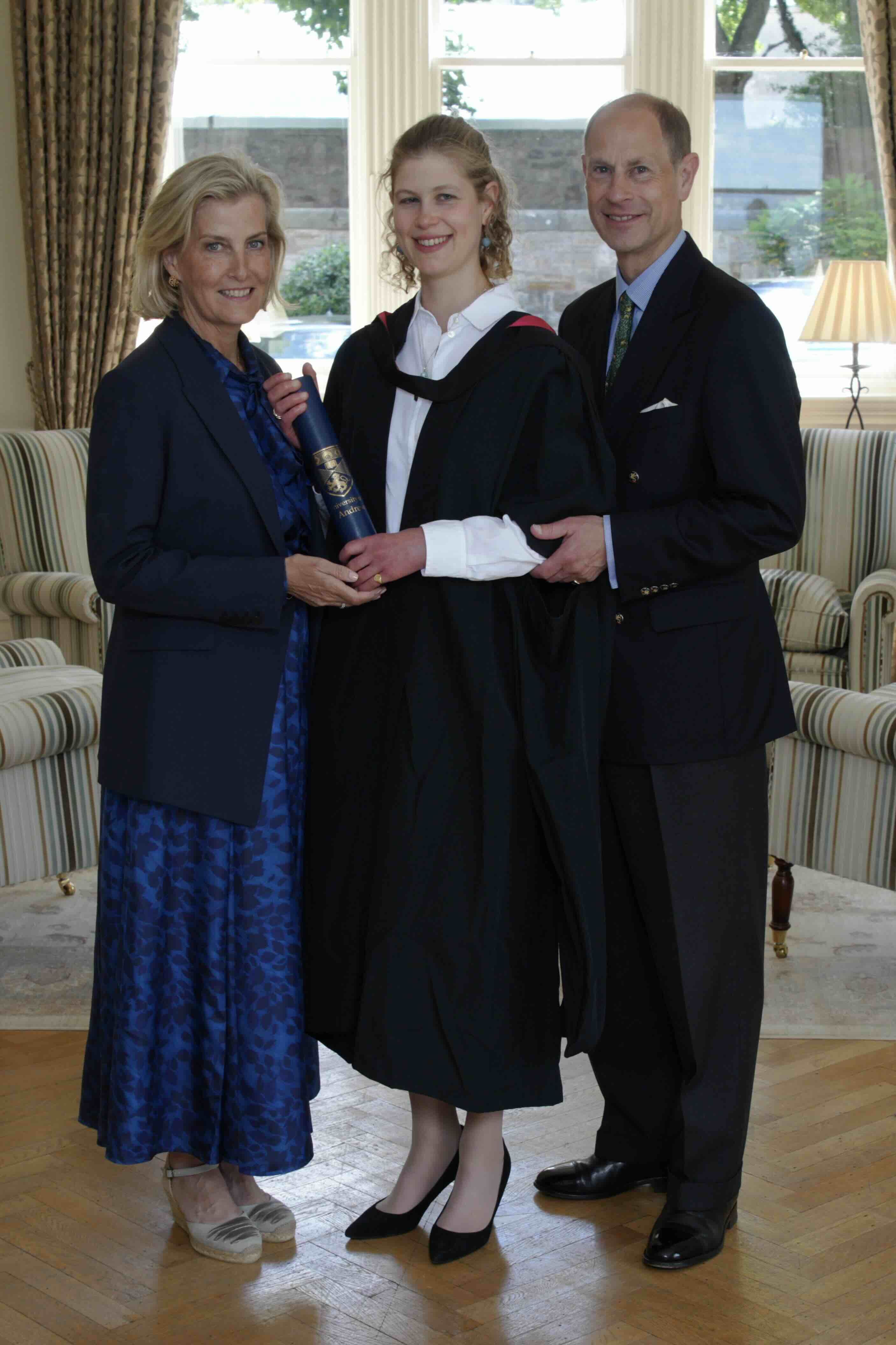 IPA86310621 - Handout photo issued by the University of St Andrews of Lady Louise Mountbatten-Windsor with her parents the Duke and Duchess of Edinburgh, at University House, following her graduation ceremony at the University of St Andrews in Scotland. Picture date: Thursday July 02, 2026.