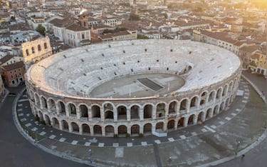 Aerial view of verona arena and historic architecture at sunset, verona, italy.