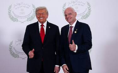 SHARM EL-SHEIKH, EGYPT - OCTOBER 13: U.S. President Donald Trump and FIFA president Gianni Infantino pose for a photo, at a world leaders' summit on ending the Gaza war on October 13, 2025 in Sharm El-Sheikh, Egypt. President Trump is in Egypt to meet with European and Middle Eastern leaders in what’s being billed as an international peace summit, following the start of a US-brokered ceasefire deal to end the war in the Gaza Strip. (Photo by Suzanne Plunkett - Pool / Getty Images)