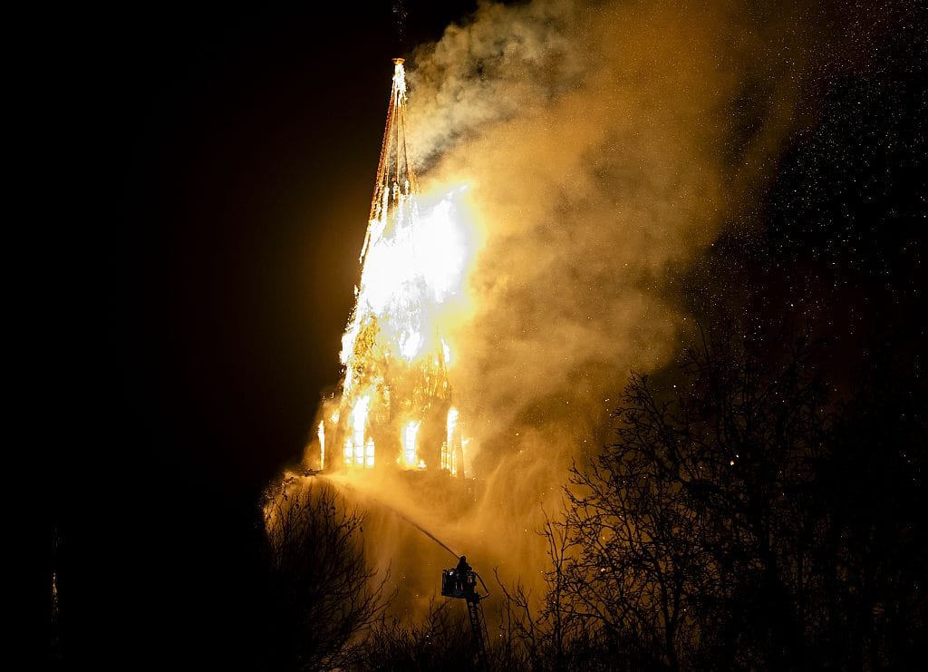 A fire tears through the Vondelkerk church tower in Amsterdam on New Year's eve, on January 1, 2026. (Photo by Remko DE WAAL / ANP / AFP via Getty Images) / Netherlands OUT
