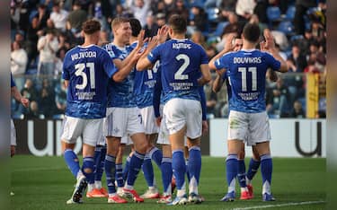 Como 1907's  players celebrate the goal scored by Como 1907's defender Marc-Oliver Kempf during the Italian Serie A soccer match between Como 1907 and US Lecce at Giuseppe Sinigaglia stadium in Como, Italy, 28 February 2026.   ANSA / ROBERTO BREGANI