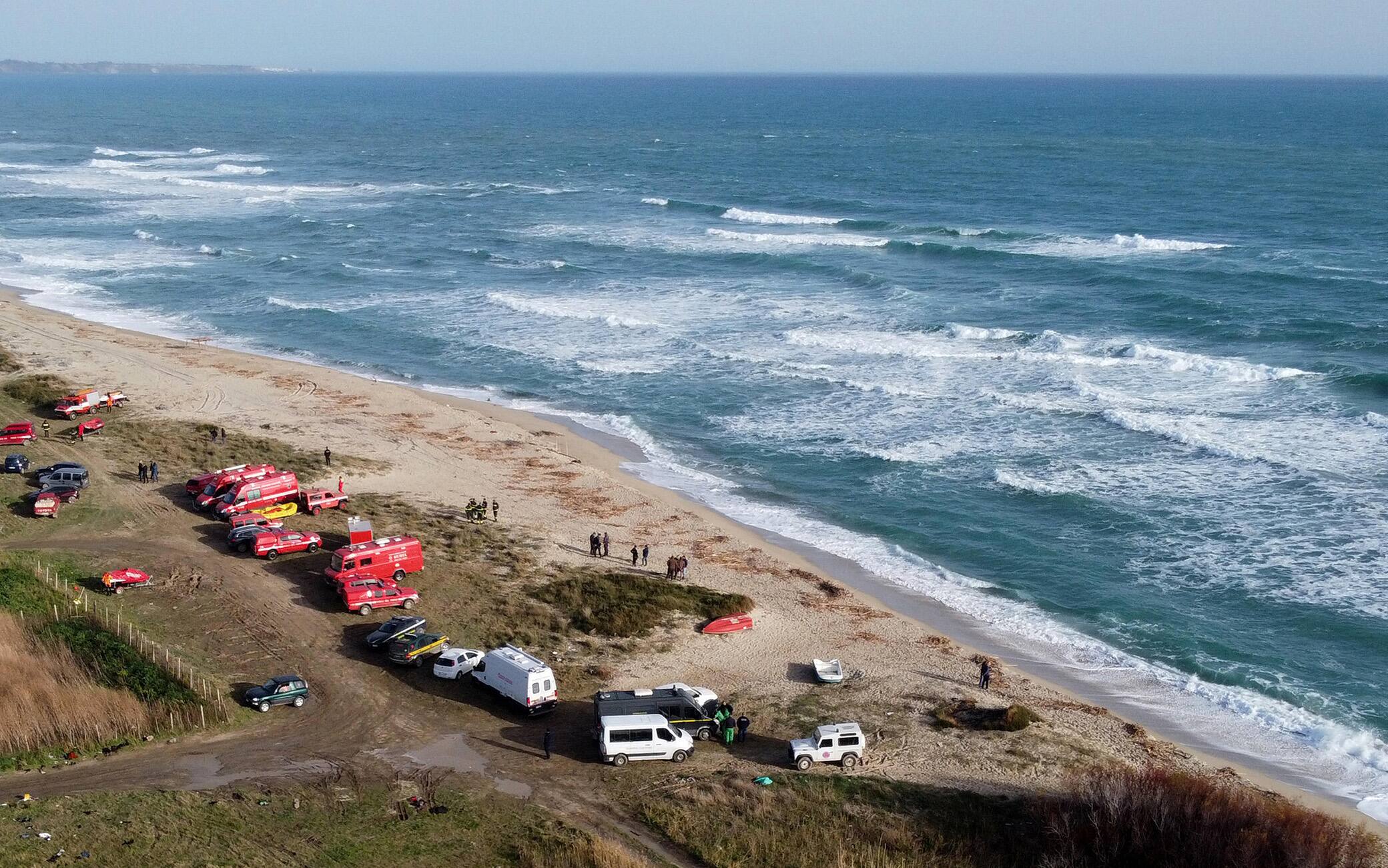 Rescue teams on the beach of Steccato di Cutro, near Crotone, Calabria region, as the search for further survivors and more victims of a migrants' boat that sank off the beach of Steccato di Cutro on 26 February continues, 27 February 2023. At least 62 migrants, including 11 children and a newborn baby, died after their overloaded boat sank early on 26 February 2023 in stormy seas off Italy's southern Calabria region, officials said. ANSA/CARMELO IMBESI