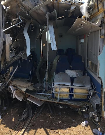 The trains wreckage at the site of the head-on commuter train collision occurred Tuesday between the towns of Andria and Corato, in the southern Puglia region, Italy, 13 July 2016. The death toll has risen to 23 dead and 50 injured, while four people are still missing. Local prosecutors have launched a multiple manslaughter probe into the crash that took place on a single track, and may have been caused by human error. ANSA/ MILENA DI MAURO
