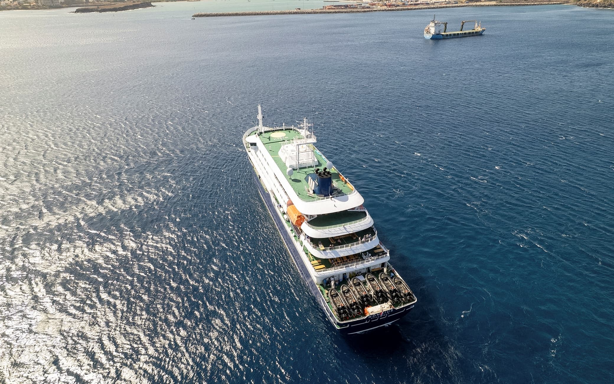 This aerial picture shows a general view of the cruise ship MV Hondius stationary off the port of Praia, the capital of Cape Verde, on May 3, 2026. An outbreak of "severe acute respiratory illness" on board a cruise ship in the Atlantic has left two people dead and a third in intensive care in Johannesburg, South Africa's health ministry told AFP on May 3, 2026.
The outbreak occurred on the MV Hondius, travelling from Ushuaia in Argentina to Cape Verde. The patient being treated in Johannesburg tested positive for a hantavirus, a family of viruses that can cause hemorrhagic fever, South African spokesperson Foster Mohale said. (Photo by AFP)