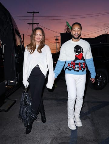 IPA52407154 - Los Angeles, CA  - *EXCLUSIVE*  - The couple were all smiles as they attended an adoption event held at the Flamingo Estate boutique store in LA. Legend wore a Bottega Veneta John John Colorblock Jacquard Wool Blend Sweater and Teigen held a Chloe Fringed leather shoulder bag while attending the event...Pictured: Chrissy Teigen, John Legend..BACKGRID USA 14 DECEMBER 2024 ..USA: +1 310 798 9111 / usasales@backgrid.com..UK: +44 208 344 2007 / uksales@backgrid.com..*UK Clients - Pictures Containing Children.Please Pixelate Face Prior To Publication*