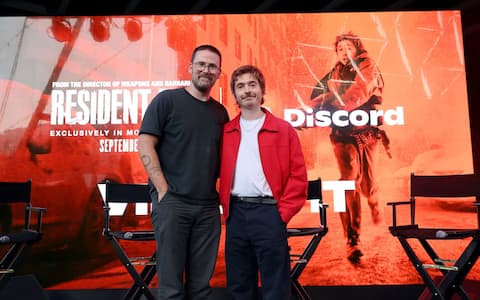 SAN DIEGO, CALIFORNIA - JULY 23: Director/Writer Zach Cregger and Austin Abrams at Fan Event At Comic-Con For Constantin Film And Columbia Pictures' "Resident Evil" on July 23, 2026 in San Diego, California. (Photo by Eric Charbonneau/Sony Pictures via Getty Images)