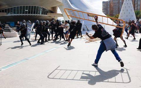 epa13278426 Protesters clash with police during a demonstration against the housing crisis in Valencia, Spain, 03 October 2026. Several demonstrations across the main cities of Spain are calling on the authorities to solve the housing problems. The eviction of an 87-year-old woman from her rental home after 70 years on 23 September 2026 prompted people across the country to take to the streets against the ongoing housing crisis. The government failed on 02 October in its attempt to pass its proposed emergency housing decrees in the Lower Chamber of the Spanish Parliament.  EPA/Kai Forsterling