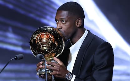 Paris Saint-Germain's French forward Ousmane Dembele kisses the Ballon d'Or award during the 2025 Ballon d'Or France Football award ceremony at the Theatre du Chatelet in Paris on September 22, 2025. (Photo by Franck FIFE / AFP) (Photo by FRANCK FIFE/AFP via Getty Images)          