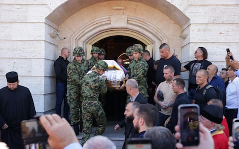 epa13219601 Members of the honor guard carry the coffin during the funeral for Ratko Mladic in Belgrade, Serbia, 07 September 2026. Former Bosnian Serb general Ratko Mladic, who was convicted of war crimes by the International Criminal Tribunal for the Former Yugoslavia (ICTY) in 2017, died on 27 August 2026 at the age of 84.  EPA/ANDREJ CUKIC