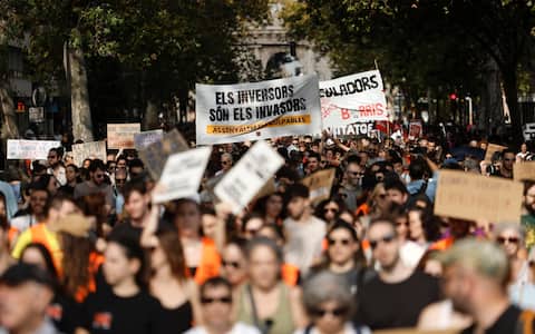 epa13278266 Activists attend a demonstration against the housing crisis in Valencia, Spain, 03 October 2026. Several demonstrations across the main cities of Spain are calling on the authorities to solve the housing problems. The eviction of an 87-year-old woman from her rental home after 70 years on 23 September 2026 prompted people across the country to take to the streets against the ongoing housing crisis. The government failed on 02 October in its attempt to pass its proposed emergency housing decrees in the Lower Chamber of the Spanish Parliament.  EPA/Kai Forsterling