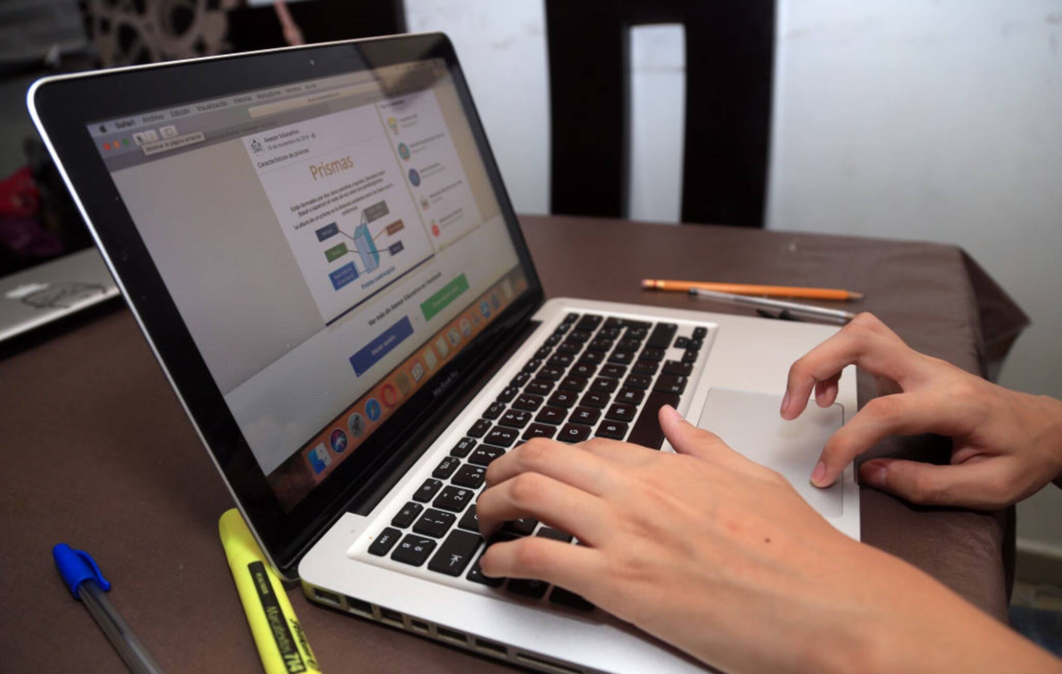 MONTERREY, MEXICO - AUGUST 24: Student takes classes on a Laptop during the start of the school year from home on August 24, 2020 in Monterrey, Mexico. Mexican government will not allow in-person lessons this year and has developed a remote education system based on TV broadcasting. "Aprende en Casa" ("learn at home") program will support around 30 million students in the country in the 4 levels of basic education (kindergarten, preschool, elementary and secondary school) during the Covid-19 pandemic. Books will be available in an online platform and over 4,000 educational TV programs have been prepared to be broadcasted in different channels. According to official statistics, 56% of households have access to internet while 93% have a television. Radio programs will also be used to reach those kids with no connection nor TV, specially at indigenous communities. (Photo by Medios y Media/Getty Images)