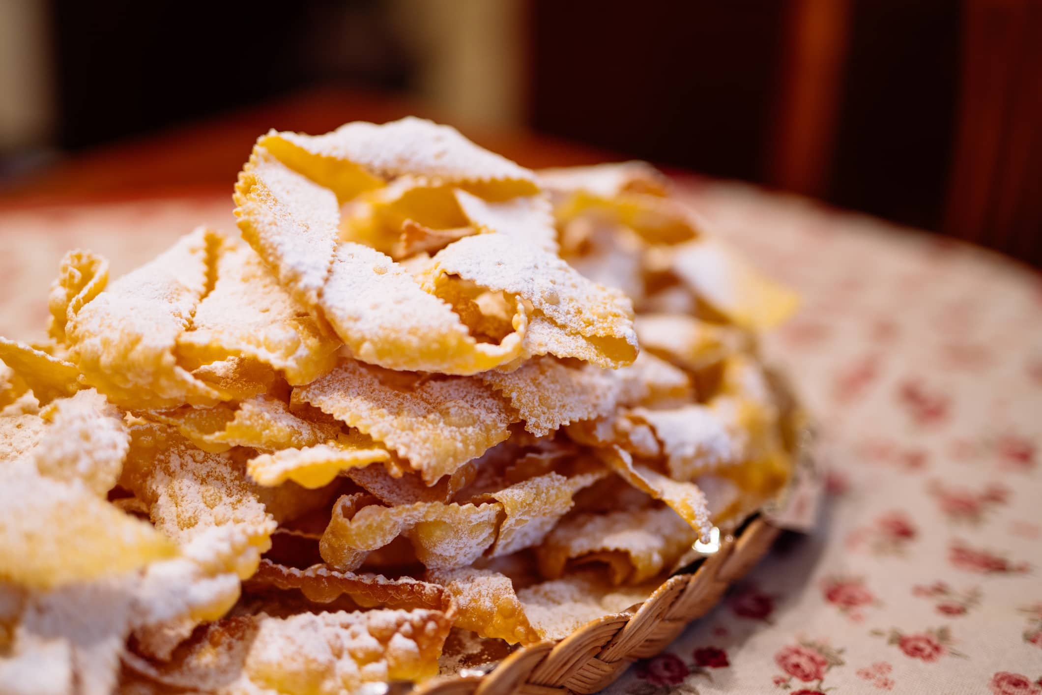Frappe, also known as Chiacchiere or Angel wings, typical italian sweet fried pastry plate, usually homemade during Carnival celebrations