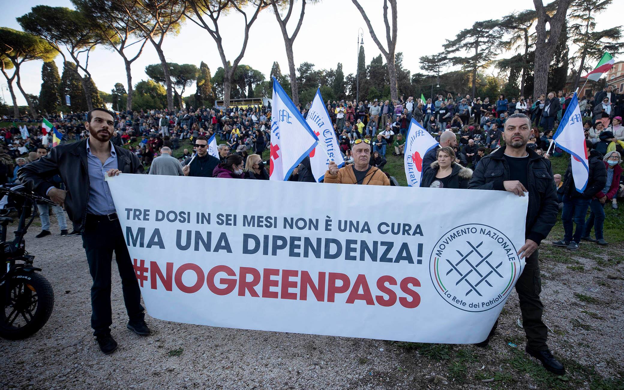 People take part in a 'No Green Pass' rally at the Circus Maximus, in Rome, Italy, 20 November 2021. The obligation to have the Green Pass coronavirus vaccine passport to enter all Italian public and private workplaces came into force last 15 October. ANSA/ MASSIMO PERCOSSI