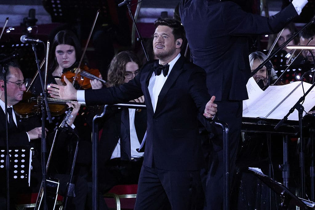 VATICAN CITY, VATICAN - DECEMBER 06: Singer Michael BublÃ© performs during the annual Christmas Vatican "Concert with the Poor" at its sixth edition at the Paul VI Hall on December 06, 2025 in Vatican City, Vatican. (Photo by Franco Origlia/Getty Images)