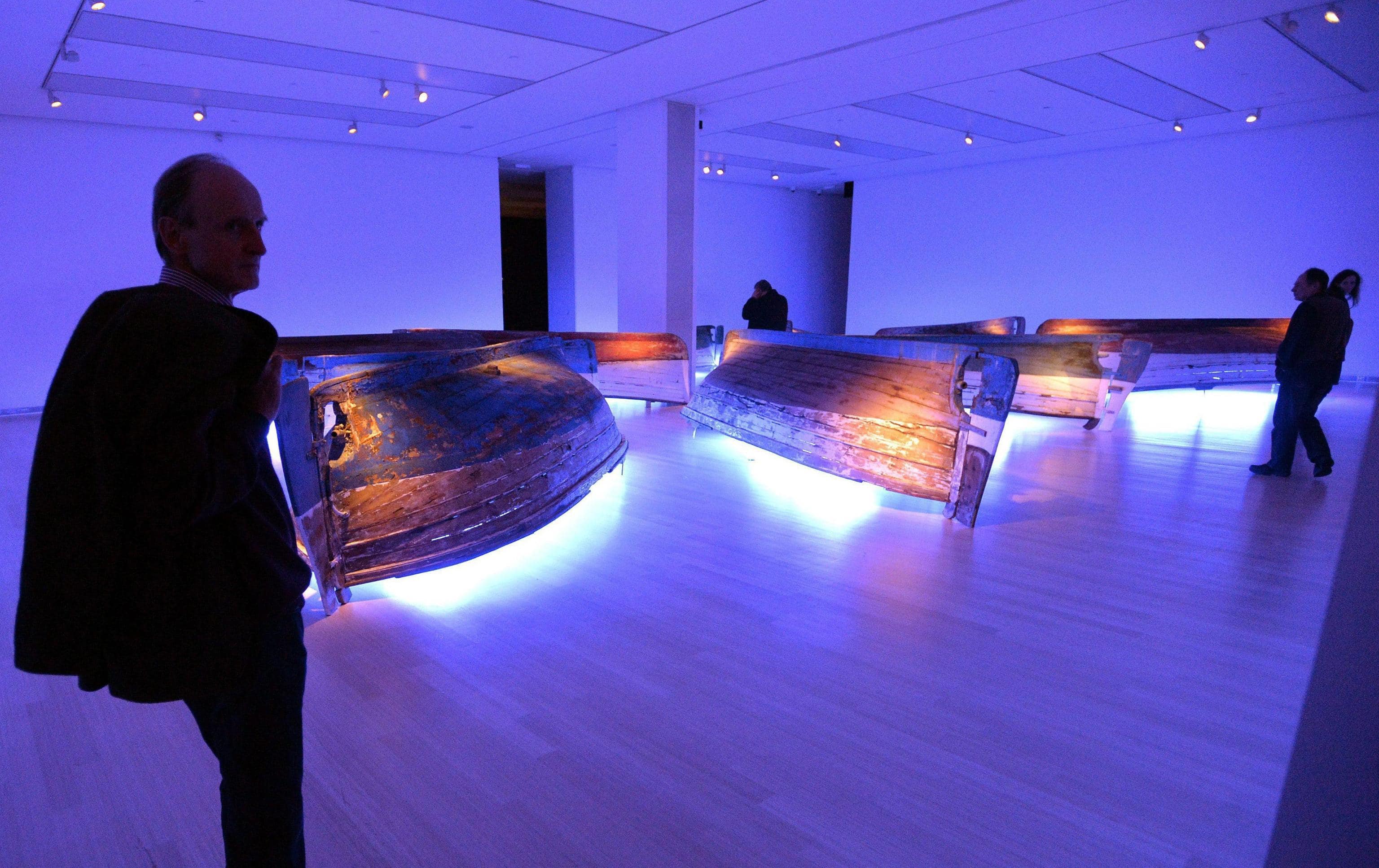 epa04048767 Visitors watch an istallation titled 'Light' during the exhibition of Italian contemporary artist Fabrizio Plessi under the title 'Liquid Labyrinth' in the Ludwig Museum in Budapest, Hungary, 30 January 2014. The exhibition will run from 31 January to 13 April.  EPA/Zoltan Mathe HUNGARY OUT