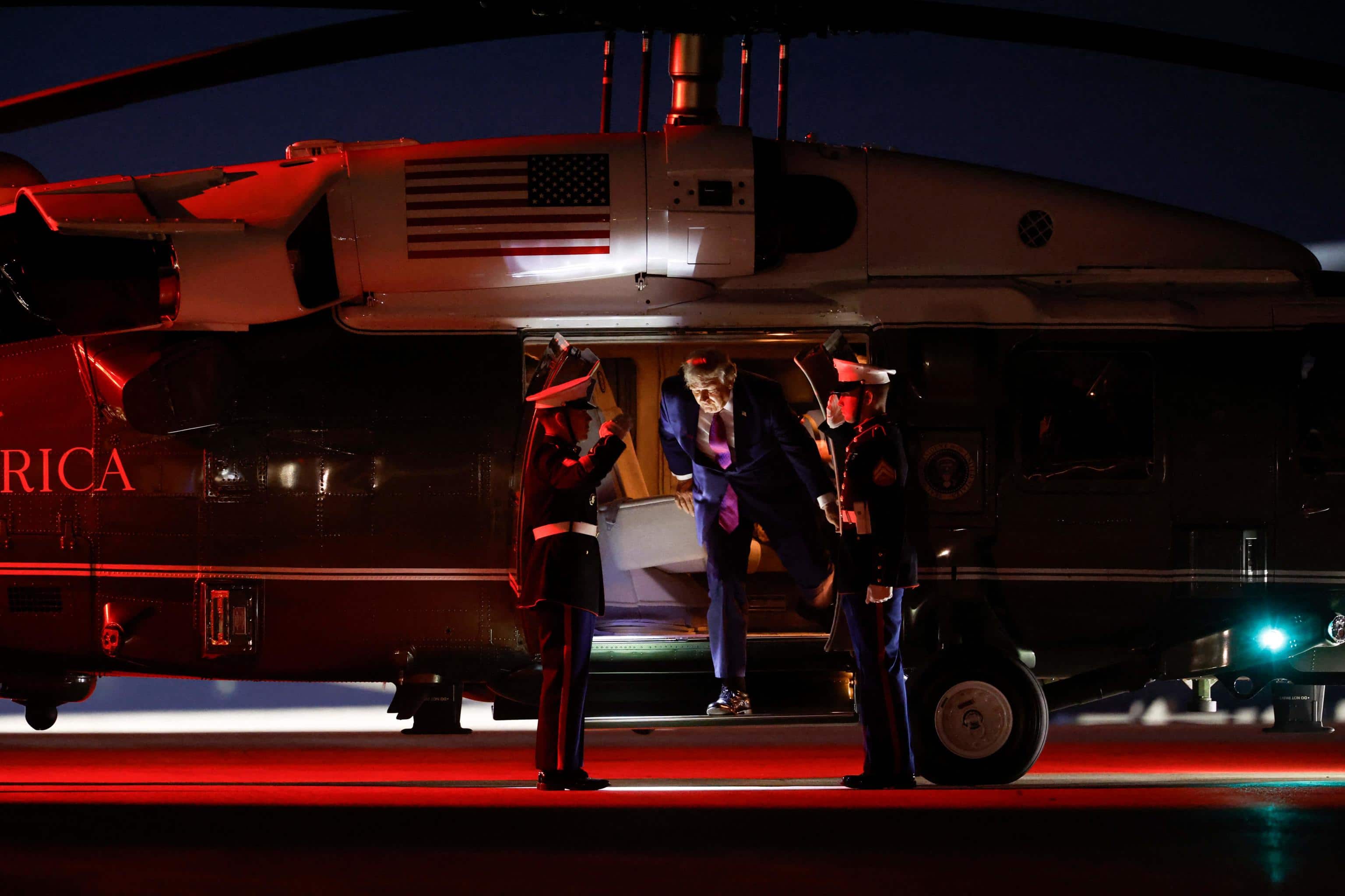 ELLSWORTH AIR FORCE BASE, SOUTH DAKOTA - JULY 03: U.S. President Donald Trump steps off of Marine One before departing in Air Force One on July 03, 2026 at Ellsworth Air Force Base, South Dakota. Trump is holding a rally and fireworks show at Mount Rushmore, kicking off a weekend of 250th Independence Day celebrations across the country.   Chip Somodevilla/Getty Images/AFP (Photo by CHIP SOMODEVILLA / GETTY IMAGES NORTH AMERICA / Getty Images via AFP)