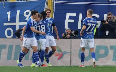 Como 1907's  players celebrate the goal scored by Como 1907's forward Assane Diao Diaoune during the Italian Serie A soccer match between Como 1907 and AC Pisa at Giuseppe Sinigaglia stadium in Como, Italy, 22 March 2026.   ANSA / ROBERTO BREGANI