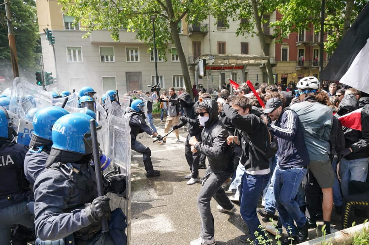 May Day Clashes in Turin: Police Use Water Cannons and Tear Gas During Protests