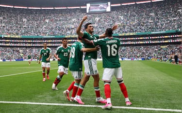 MEXICO CITY, MEXICO - JUNE 11: Raul Jimenez #9 of Mexico celebrates with teammates after scoring the team's second goal during the FIFA World Cup 2026 Group A match between Mexico and South Africa at Mexico City Stadium on June 11, 2026 in Mexico City, Mexico. (Photo by Carl Recine/Getty Images)