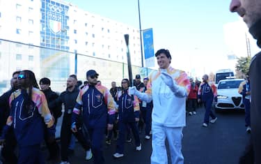 Simone Barlaam nel suo ruolo da tedoforo