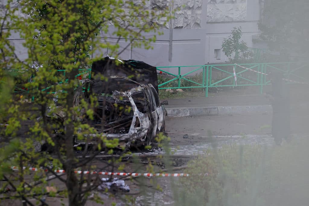 This photograph taken on April 25, 2025 shows a destroyed car in the courtyard of residential buildings following a blast in Balashikha, Moscow region on April 25, 2025. An explosive device ripped through a parked car near Moscow on April 25, 2025 killing General-lieutenant Yaroslav Moskalik, deputy head of the main operational directorate of the military's General Staff, the Investigative Committee said. (Photo by TATYANA MAKEYEVA / AFP) (Photo by TATYANA MAKEYEVA/AFP via Getty Images)          