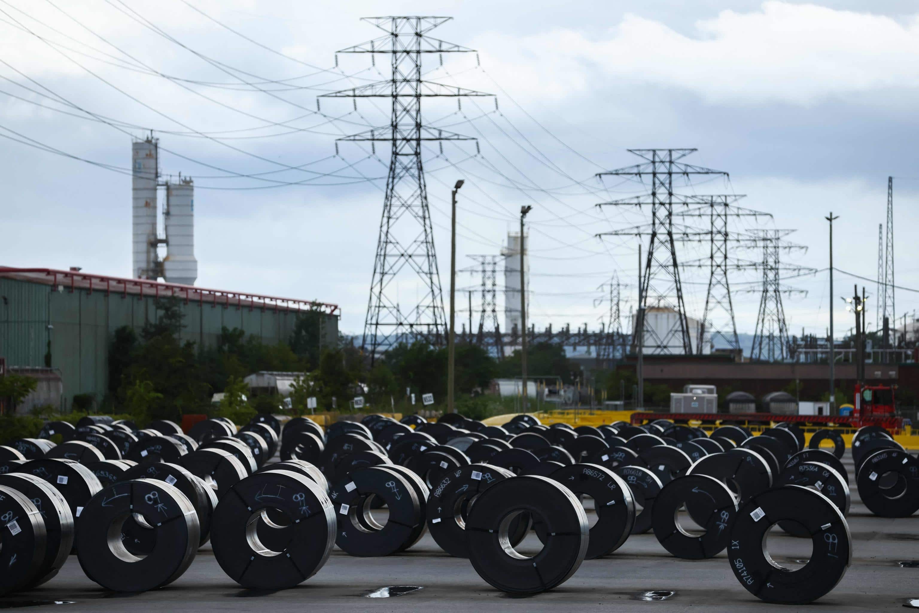 Coils of steel are seen at an ArcelorMittal Dofasco facility in Hamilton, Ontario, Canada, on August 24, 2026. The administration of US President Donald Trump warned on August 23 that Canada would be "foolish" to think it could win a trade war with the United States, predicting a "devastating" impact on its northern neighbor. Negotiations between Washington and Ottawa broke down late August 22, putting into force new 50-percent US tariffs impacting about $20 billion worth of Canadian goods, or 5.5 percent of Canadian exports to the US. Canada in retaliation said it would match US tariffs, with new levies notably targeting the US steel and dairy industries to take effect on September 8. (Photo by Cole Burston / AFP)