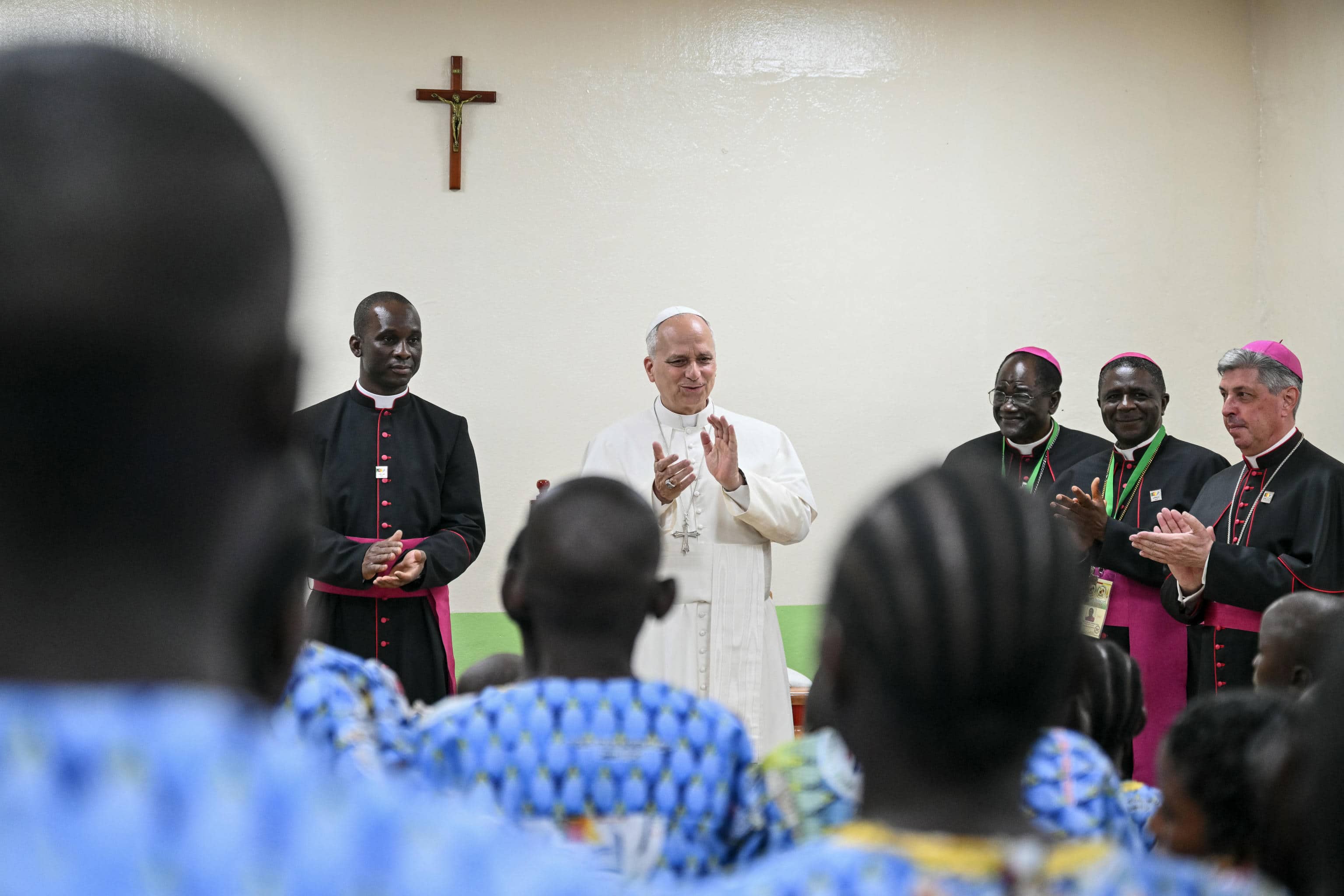 Pope Leo XIV (4th R) visits the Ngul Zamba (Power of God) orphanage in Yaounde, on the third day of an 11-day apostolic journey to Africa, on April 15, 2026. ANSA/AFP/ Alberto PIZZOLI / POOL 