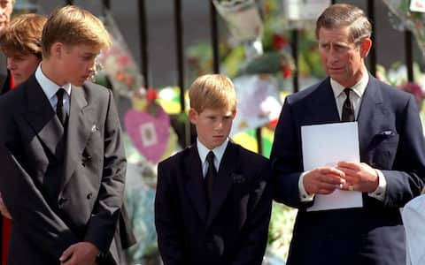 LONDON - SEPTEMBER 6:  The Prince of Wales with Prince William and Prince Harry outside Westminster Abbey at the funeral of Diana, The Princess of Wales on September 6, 1997. (Photo by Anwar Hussein/WireImage)  