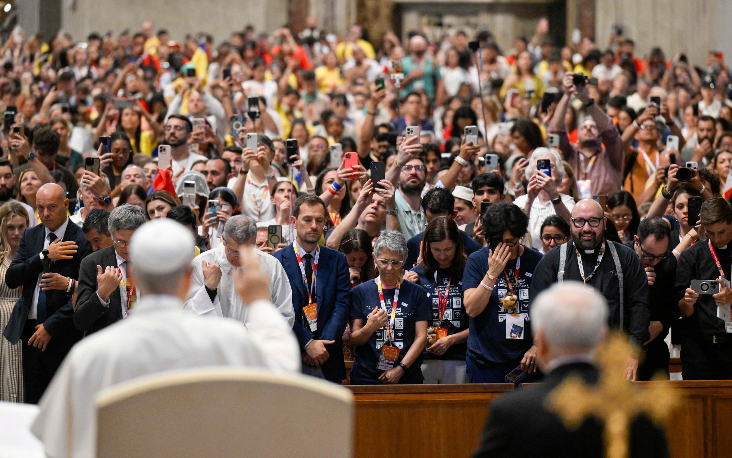 Pope Leo XIV greets faithful at the end of a mass celebrated by Cardinal Luis Antonio Tagle in St. Peter's Basilica on the occasion of the Jubilee of digital missionaries and Catholic influencers at the Vatican, 29 July 2025. ANSA/US VATICAN MEDIA +++ NPK +++ NO SALES, EDITORIAL USE ONLY +++