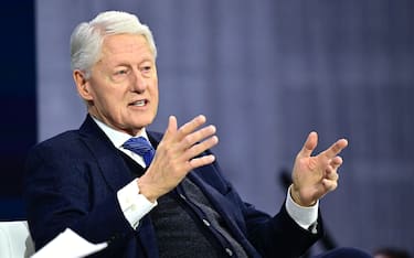 NEW YORK, NEW YORK - DECEMBER 04: Former President Bill Clinton speaks onstage during The New York Times Dealbook Summit 2024 at Jazz at Lincoln Center on December 04, 2024 in New York City.  (Photo by Eugene Gologursky/Getty Images for The New York Times)