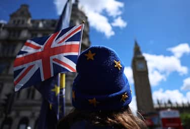 epa13055910 A pro-European Union campaigner protests in London, Britain, 10 June 2026 (issued 22 June 2026). The UK held a referendum on 23 June 2016 on its membership of the EU, in which 51.89 percent of voters chose to leave. The UK officially withdrew from the EU on 31 January 2020, followed by a transition period that ended on 31 December 2020. Since 2021, UK EU relations have been governed by the EU UK Trade and Cooperation Agreement. Brexit ended the UK's participation in the EU single market and customs union, leading to changes in trade, immigration, and regulatory alignment.  EPA/NEIL HALL  ATTENTION: This Image is part of a PHOTO SET