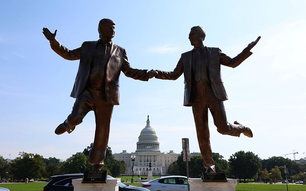 WASHINGTON, DC - SEPTEMBER 23: A statue depicting U.S. President Donald Trump and Jeffrey Epstein holding hands is seen near the U.S. Capitol on September 23, 2025 in Washington, DC. A plaque below the figures states "In Honor of Friendship Month." (Photo by Anna Moneymaker/Getty Images)