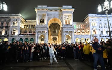 Nicoletta Manni, Italian Ballet Dancer, holds the flame in front of the Galleria Vittorio Emanuele II during the Olympic Torch Relay in Milan, Italy on February 5, 2026. Photo by Alexis Jumeau/ABACAPRESS.COM