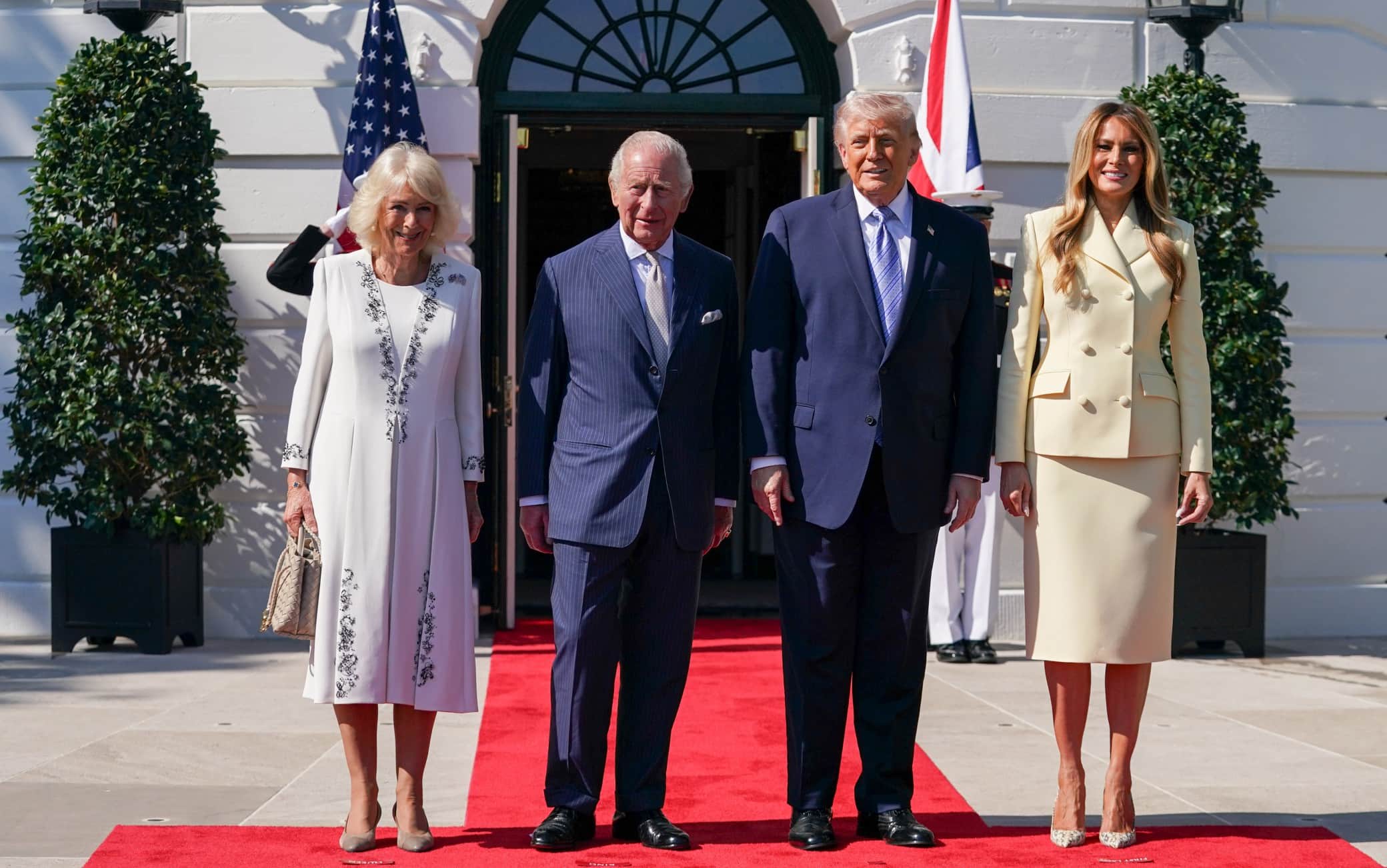 WASHINGTON, DC - APRIL 27: The United Kingdom’s King Charles and Queen Camilla, left, are greeted by U.S. President Donald Trump and First Lady Melania Trump on Monday, April 27, 2026 at the White House in Washington, D.C. (Photo by Allison Robbert/For The Washington Post)