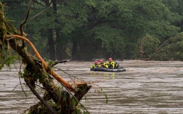 COMFORT, TEXAS - JULY 04: Boerne search and rescue teams navigate upstream in an inflatable boat on the flooded Guadalupe River on July 4, 2025 in Comfort, Texas. Heavy rainfall caused flooding along the Guadalupe River in central Texas with multiple fatalities reported. (Photo by Eric Vryn/Getty Images)