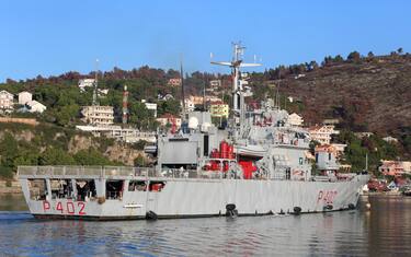 epa11709504 A group of migrants intercepted in international waters around Italy, arrive aboard the Italian Navy vessel Libra at Shengjin, Albania, 08 November 2024. Italy has sent a group of 8 migrants to Albania, after a previous group was turned away in October for failing the vetting process, in a plan aimed at deterring dangerous sea crossings by processing asylum claims outside the EU. The initiative faced legal setbacks after Italian courts ruled that migrants could not be held in Albania due to concerns over their legal status. In response, the Italian government adjusted the legal framework, hoping this would strengthen the policy, which allows up to 3,000 non-vulnerable men to be housed temporarily in Italian-run facilities in Albania.  EPA/MALTON DIBRA